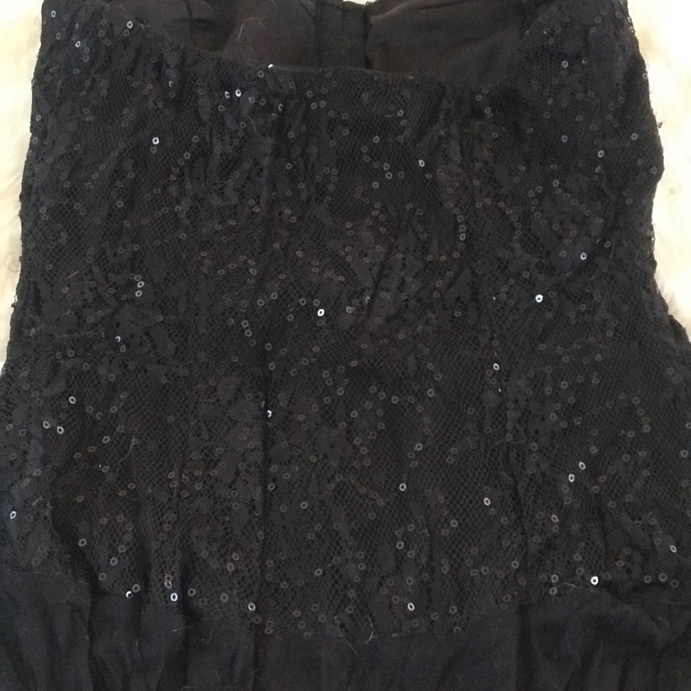 Black glitter blouse.